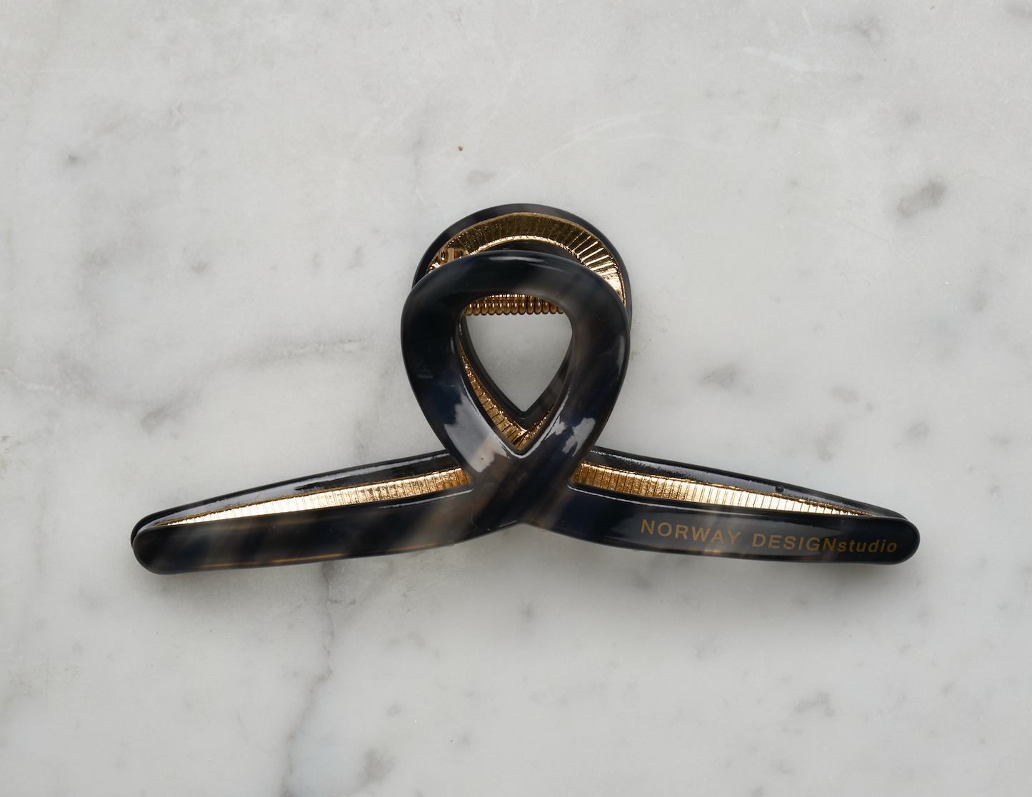 Hårklype med gull- Storm