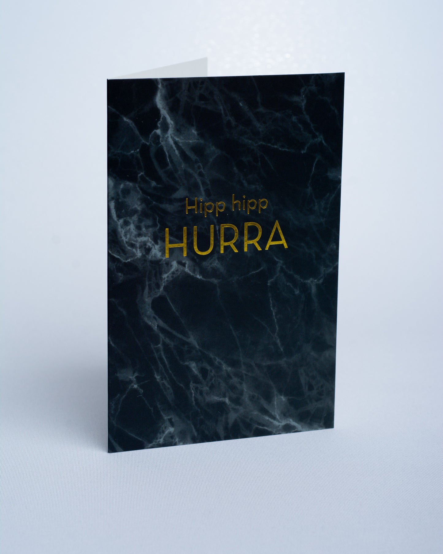 Doble kort med marmor trykk med gulltrykk. Portfoliofoto