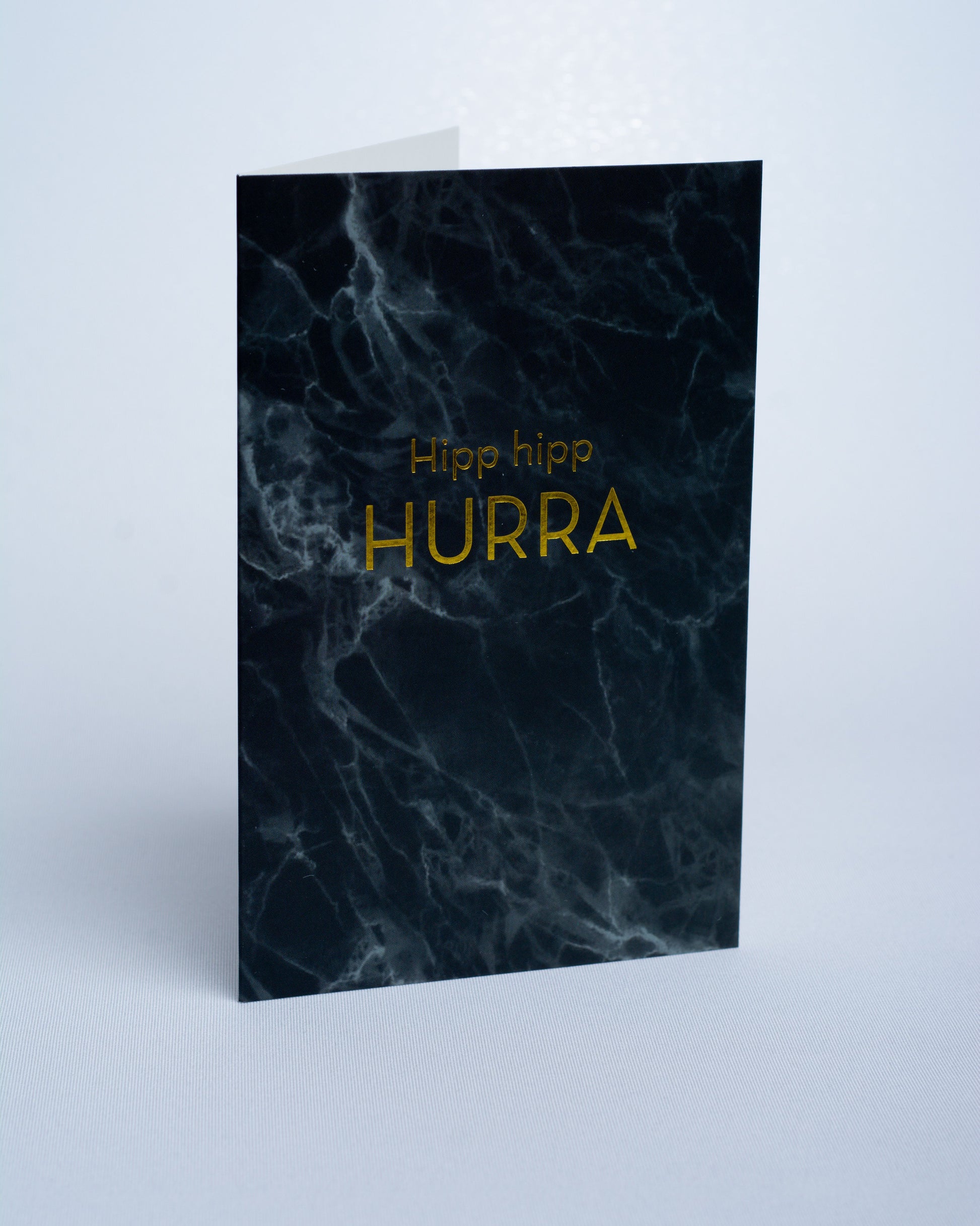 Doble kort med marmor trykk med gulltrykk. Portfoliofoto